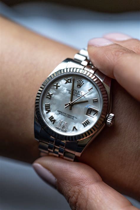 rolex 31mm datejust black mother of pearl|rolex datejust 36mm white dial.